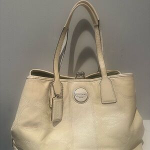 COACH 2011 Cream Patent Leather w/ Kisslock bag - has some color transfer marks